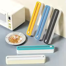 Dispenser Pellicola 2-in-1 – Organizzatore da Cucina con Taglierina